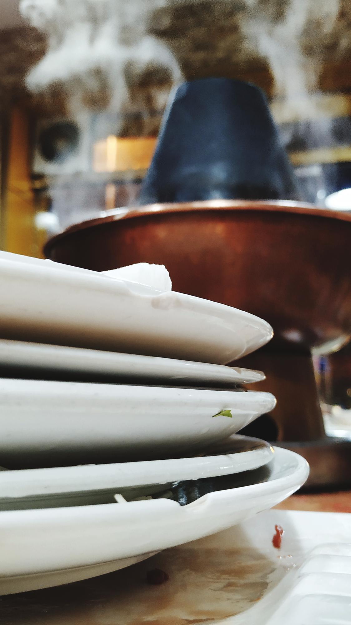 row of polished plates ready for pass